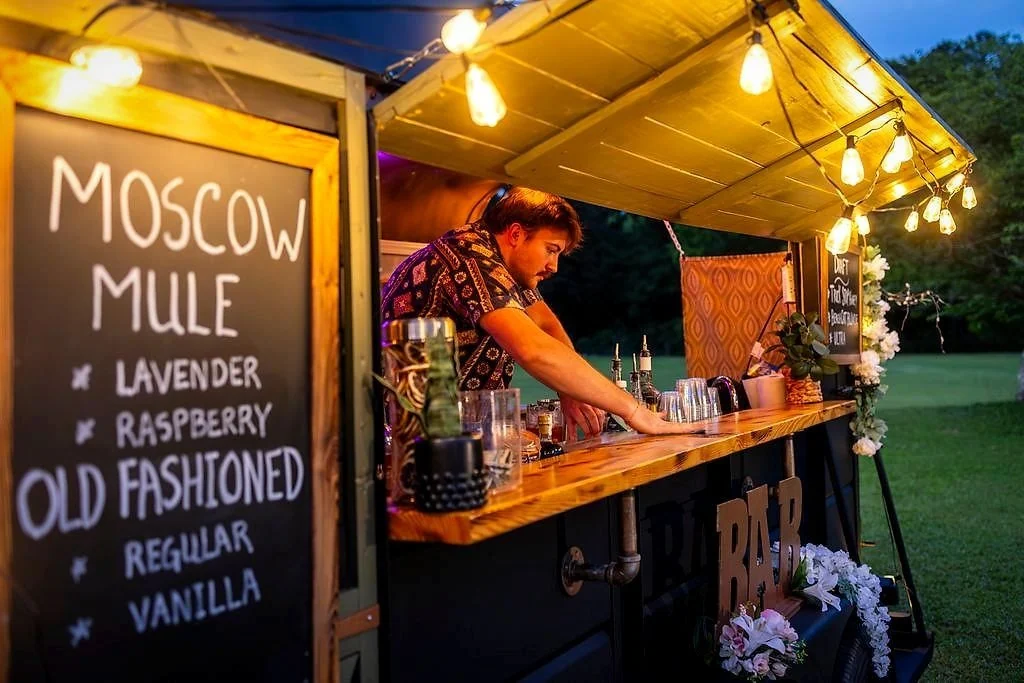 A bartender mixing at the Haulin’ Toasts bar